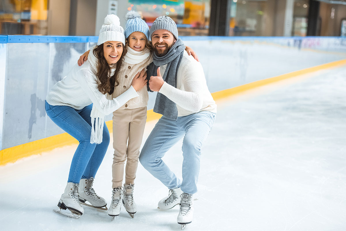 Parents & Young Girl Together On Ice Parents & Young Girl Together On Ice